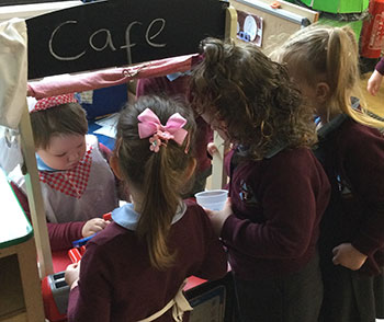 Boy with butterfly at school club